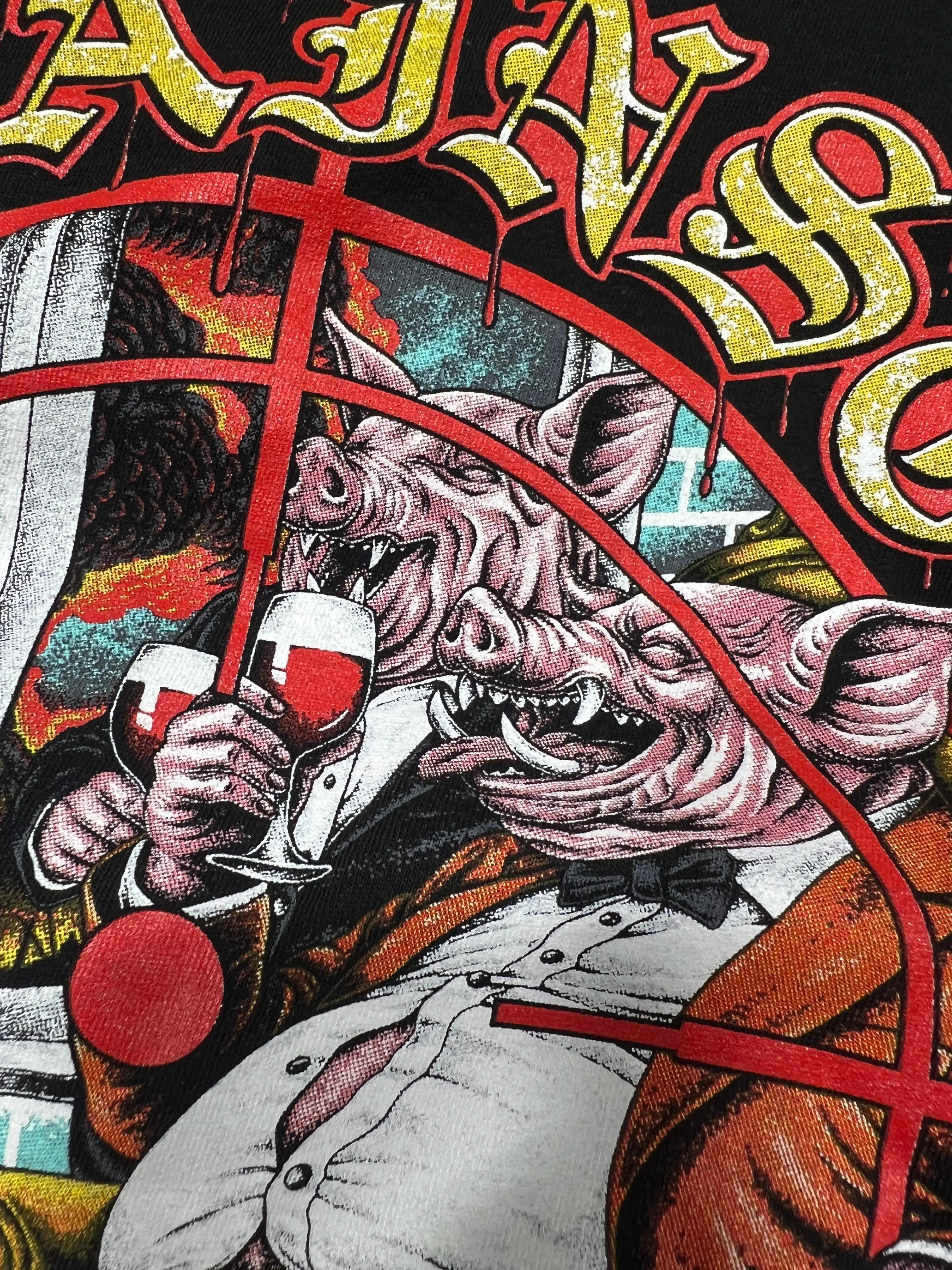 Detailed multi-color illustrated artwork printed on black apparel